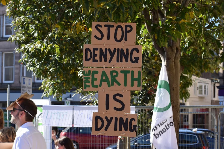 Earth is Dying Sign